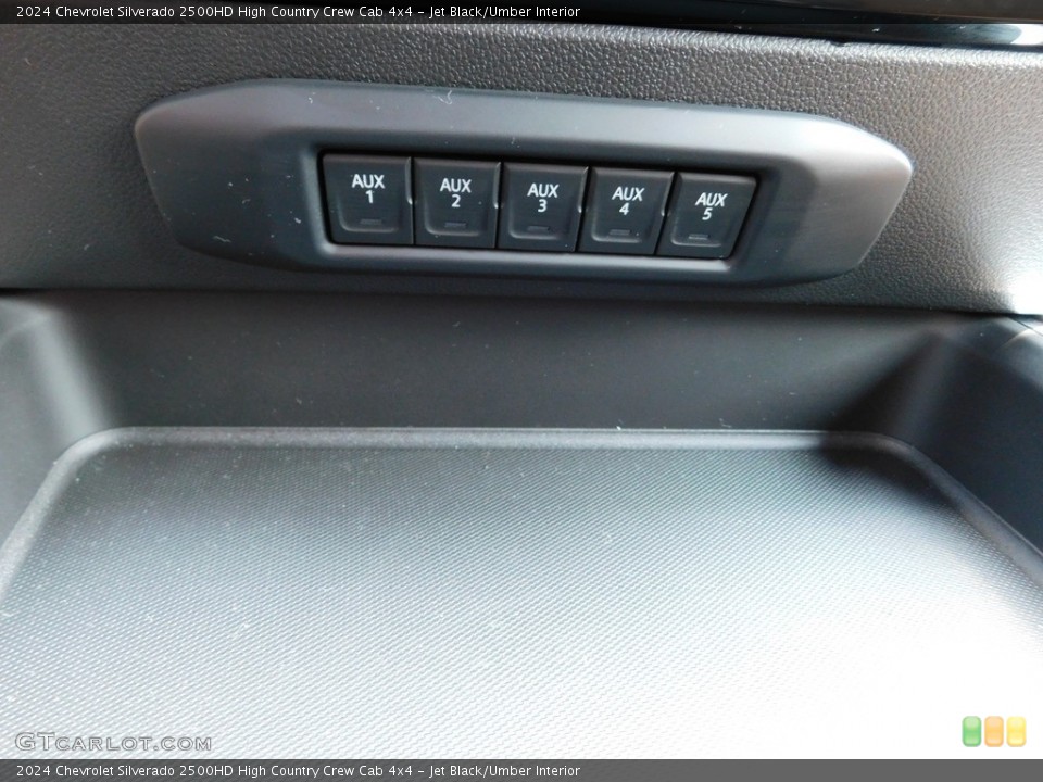 Jet Black/Umber Interior Controls for the 2024 Chevrolet Silverado 2500HD High Country Crew Cab 4x4 #146343757
