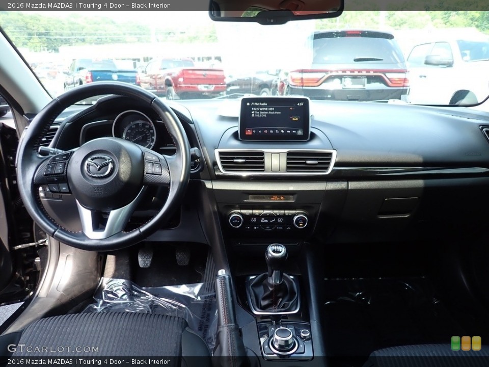 Black Interior Dashboard for the 2016 Mazda MAZDA3 i Touring 4 Door #146376905