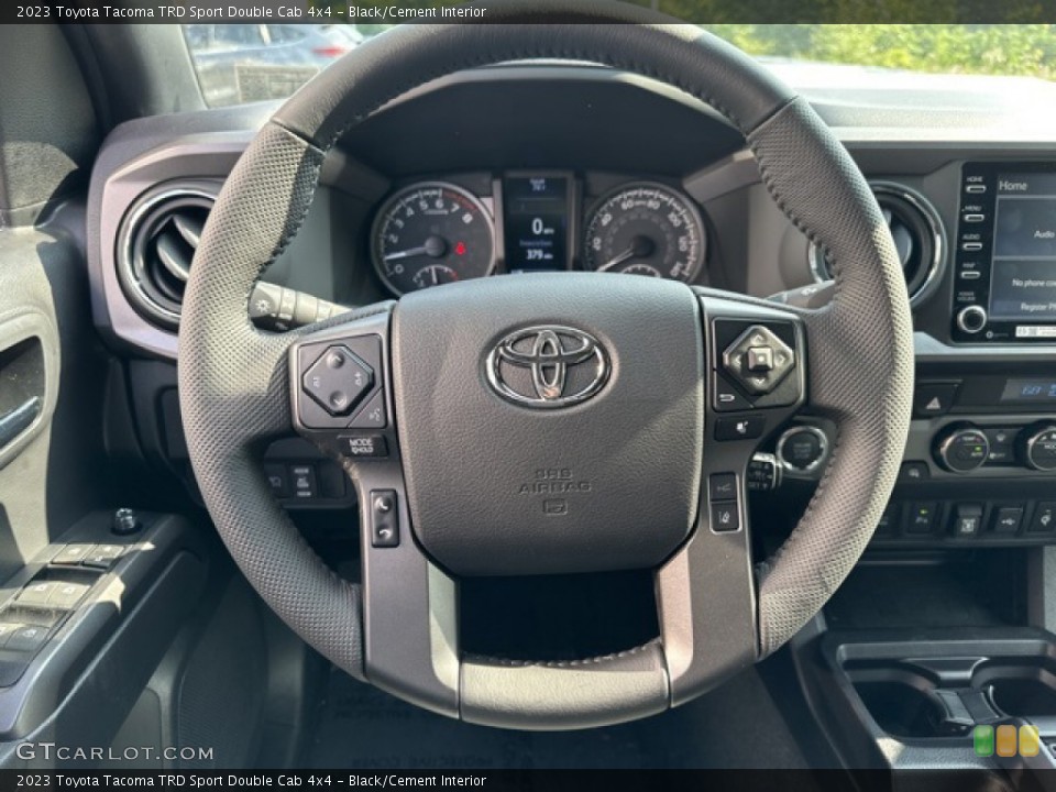 Black/Cement Interior Steering Wheel for the 2023 Toyota Tacoma TRD Sport Double Cab 4x4 #146377502