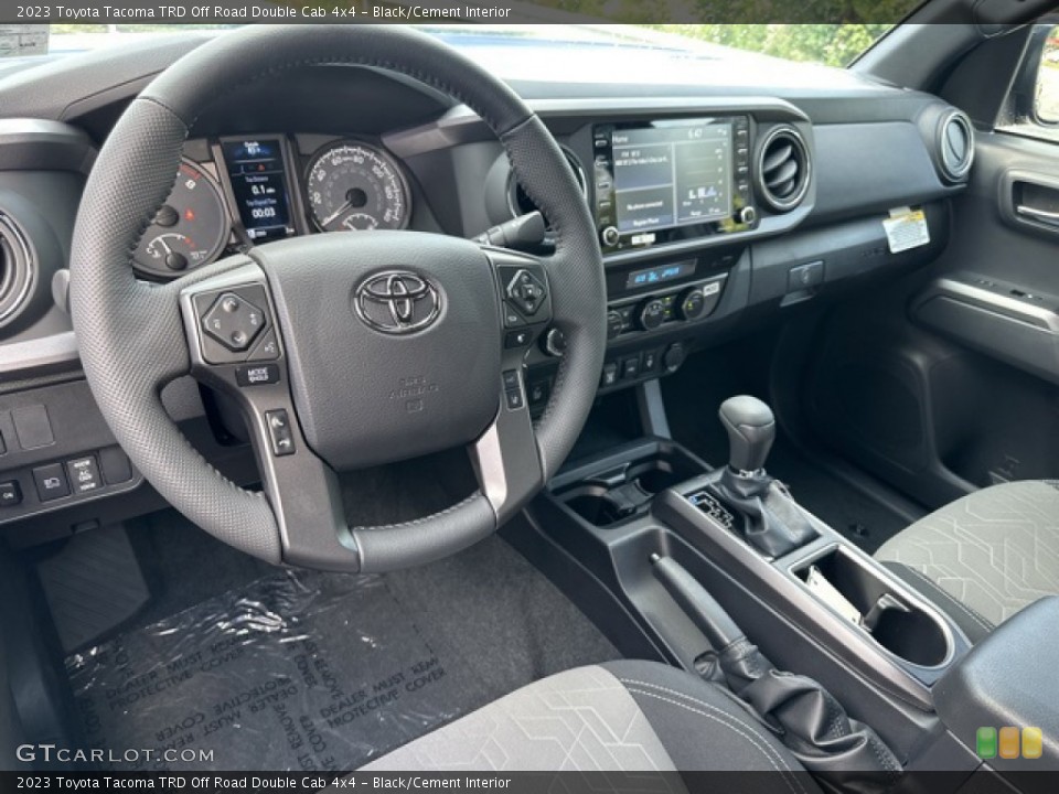 Black/Cement Interior Photo for the 2023 Toyota Tacoma TRD Off Road Double Cab 4x4 #146392755