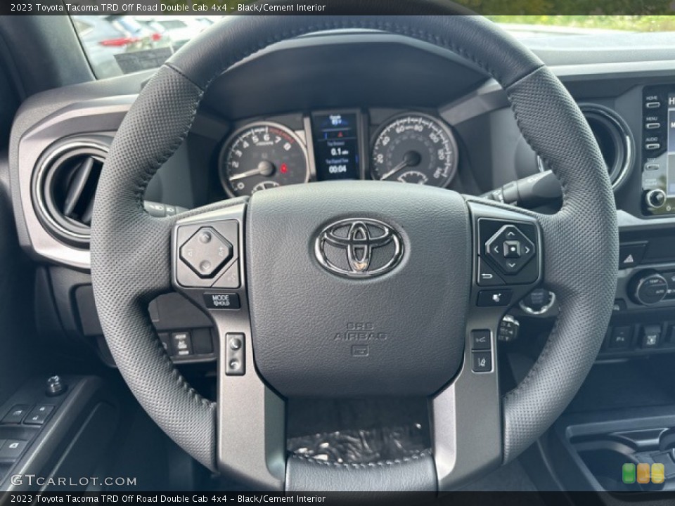 Black/Cement Interior Steering Wheel for the 2023 Toyota Tacoma TRD Off Road Double Cab 4x4 #146392862
