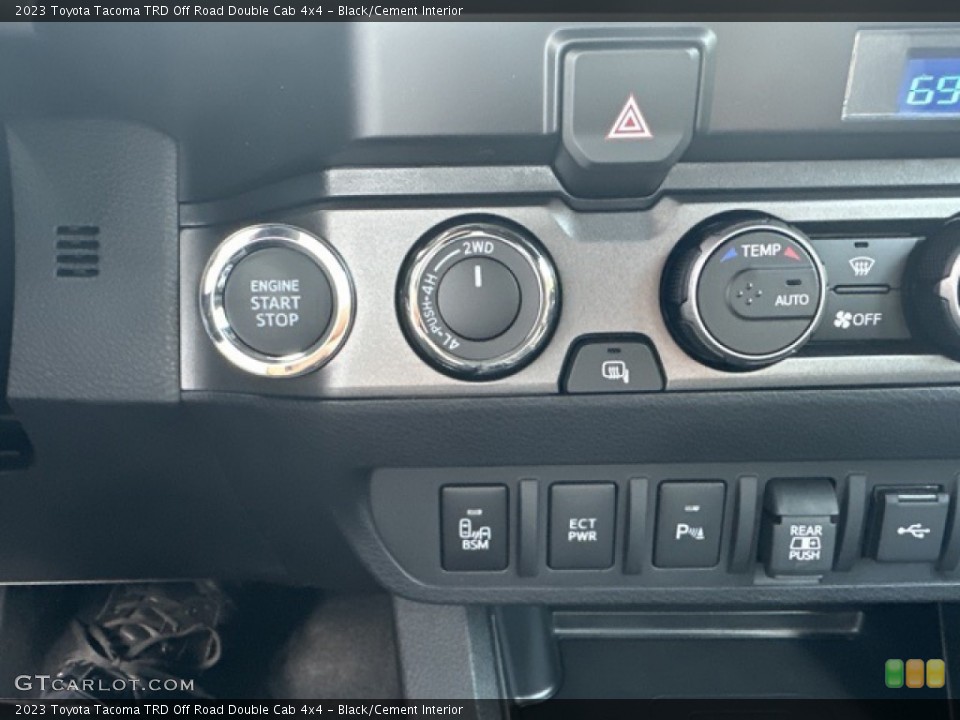 Black/Cement Interior Controls for the 2023 Toyota Tacoma TRD Off Road Double Cab 4x4 #146392967