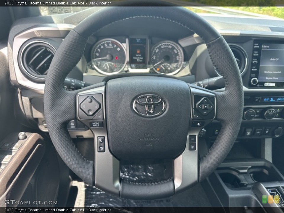 Black Interior Steering Wheel for the 2023 Toyota Tacoma Limited Double Cab 4x4 #146398235