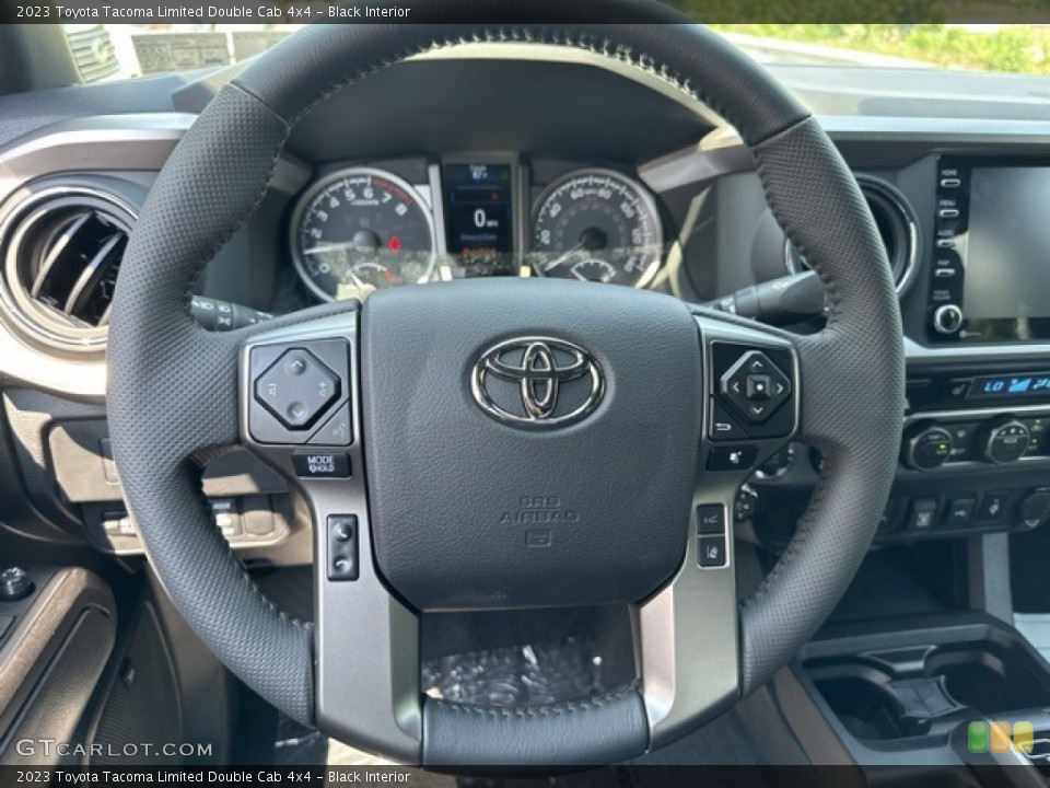 Black Interior Steering Wheel for the 2023 Toyota Tacoma Limited Double Cab 4x4 #146429705