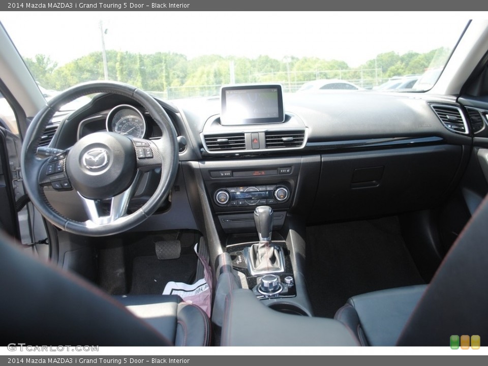 Black Interior Dashboard for the 2014 Mazda MAZDA3 i Grand Touring 5 Door #146437636