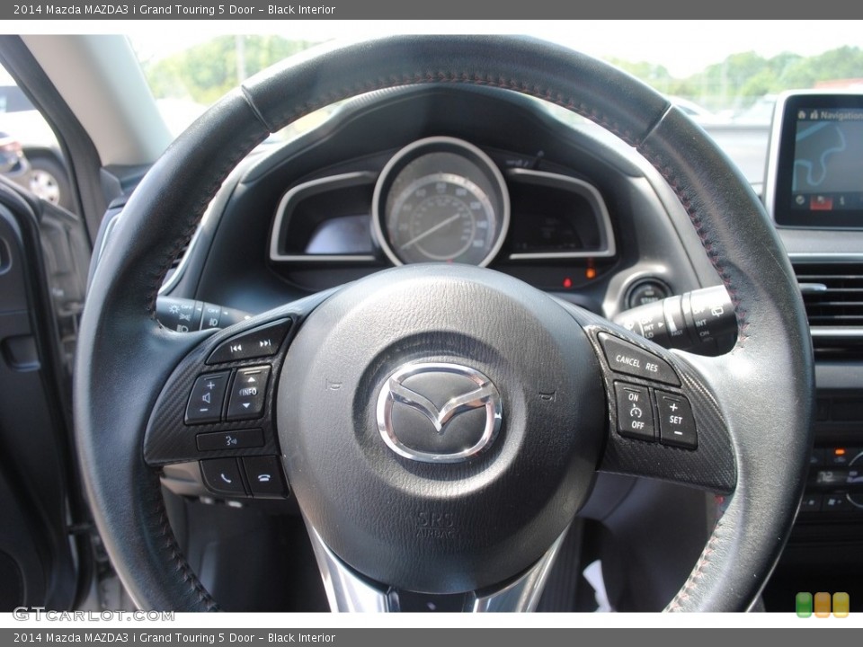 Black Interior Steering Wheel for the 2014 Mazda MAZDA3 i Grand Touring 5 Door #146437707