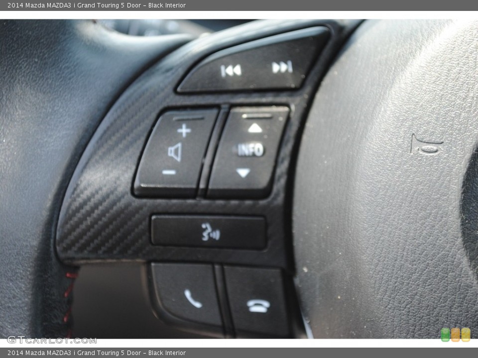 Black Interior Steering Wheel for the 2014 Mazda MAZDA3 i Grand Touring 5 Door #146437728