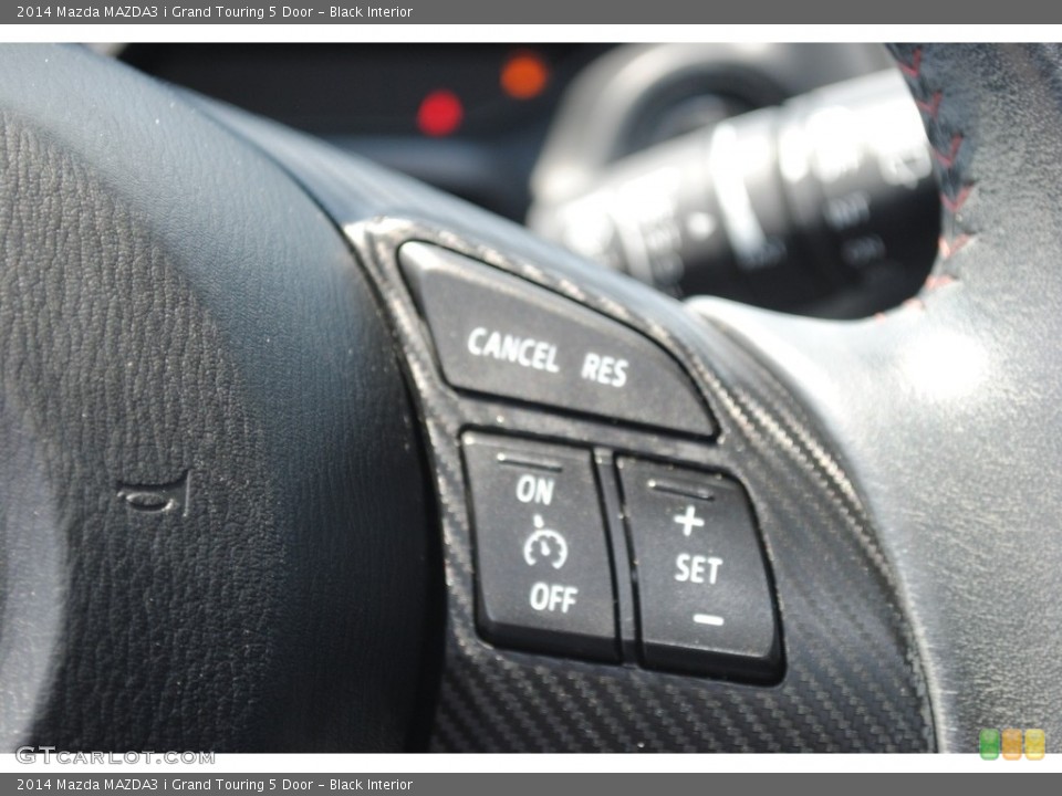 Black Interior Steering Wheel for the 2014 Mazda MAZDA3 i Grand Touring 5 Door #146437747