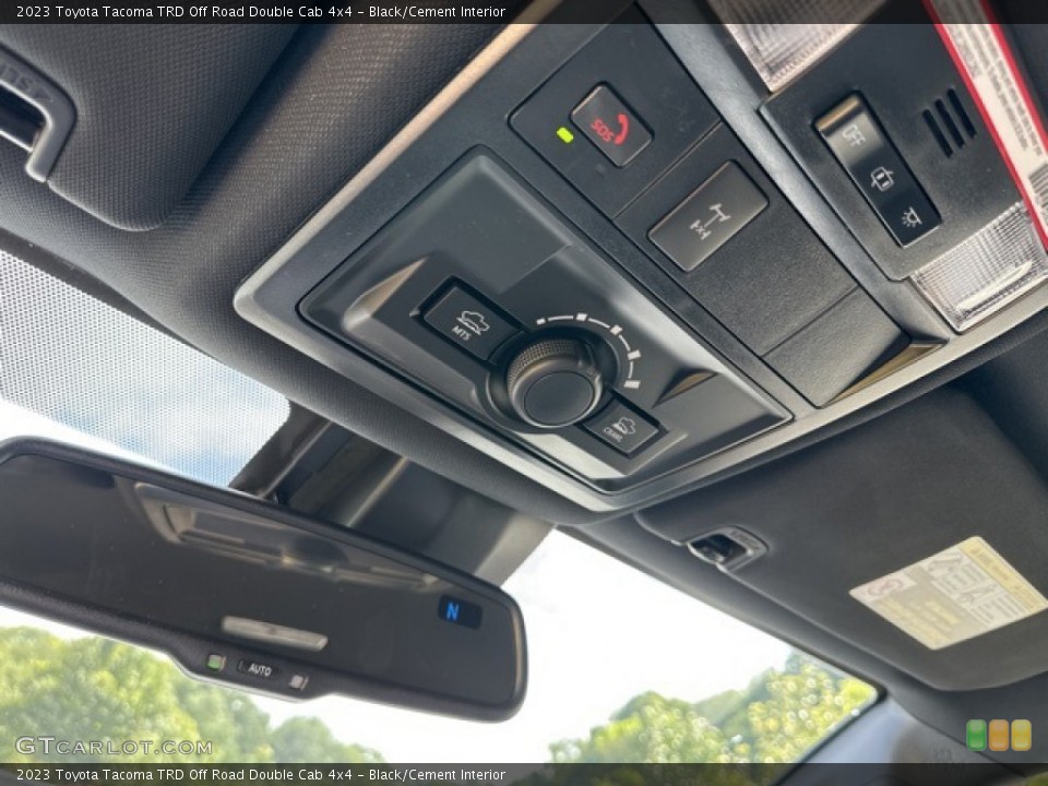 Black/Cement Interior Controls for the 2023 Toyota Tacoma TRD Off Road Double Cab 4x4 #146442826