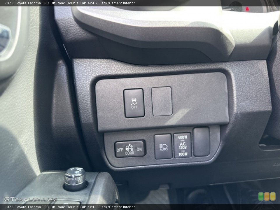 Black/Cement Interior Controls for the 2023 Toyota Tacoma TRD Off Road Double Cab 4x4 #146442841