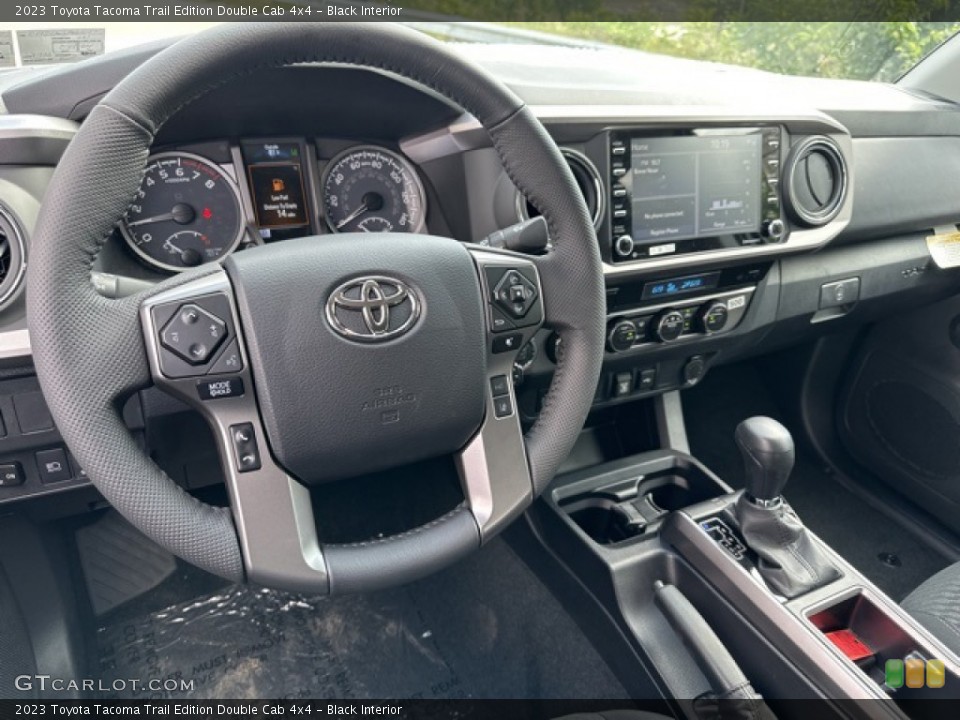 Black Interior Dashboard for the 2023 Toyota Tacoma Trail Edition Double Cab 4x4 #146442929