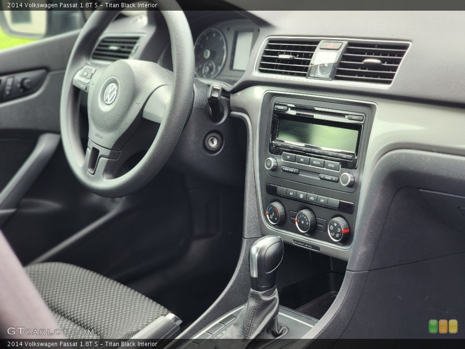 Titan Black Interior Controls for the 2014 Volkswagen Passat 1.8T S #146444189