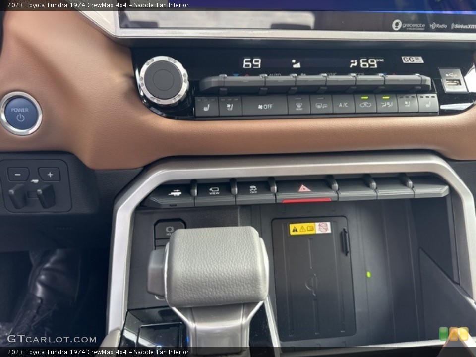 Saddle Tan Interior Controls for the 2023 Toyota Tundra 1974 CrewMax 4x4 #146479017