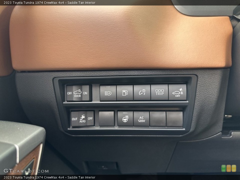Saddle Tan Interior Controls for the 2023 Toyota Tundra 1974 CrewMax 4x4 #146479062