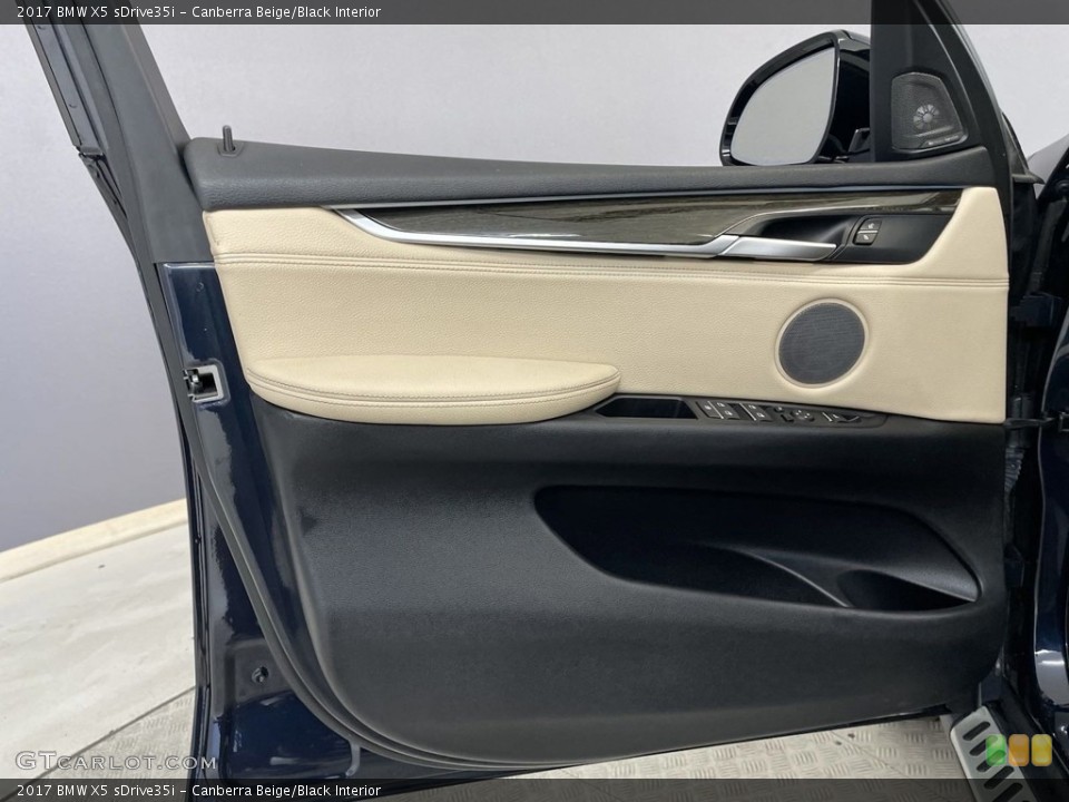 Canberra Beige/Black Interior Door Panel for the 2017 BMW X5 sDrive35i #146525325