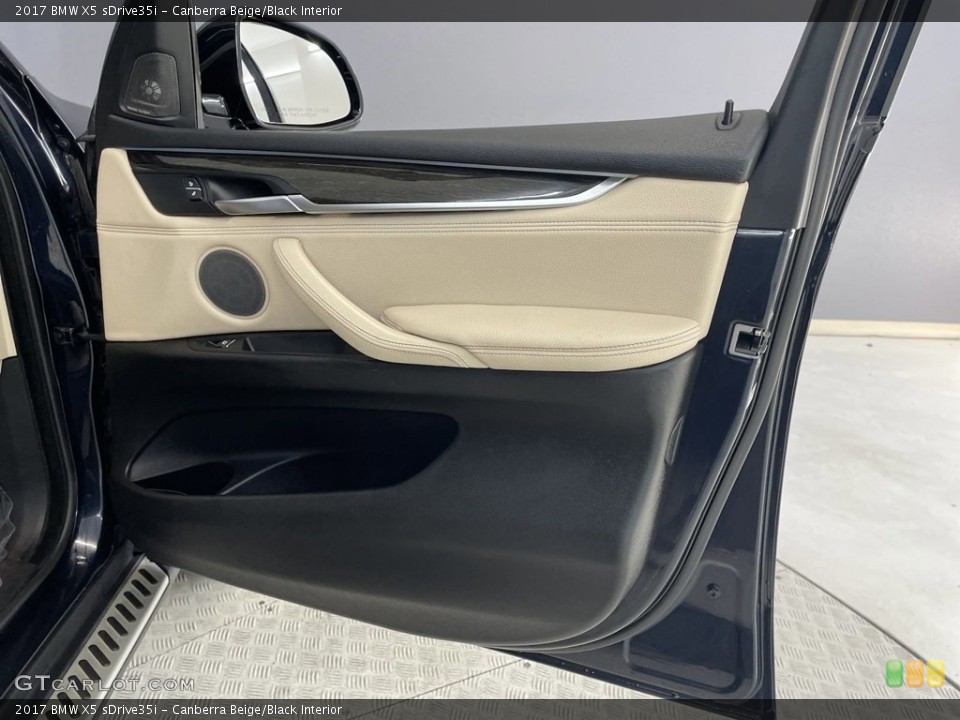 Canberra Beige/Black Interior Door Panel for the 2017 BMW X5 sDrive35i #146525840