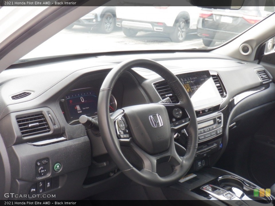 Black Interior Dashboard for the 2021 Honda Pilot Elite AWD #146547101