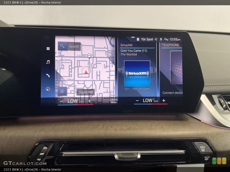 Mocha Interior Controls for the 2023 BMW X1 xDrive28i #146569779