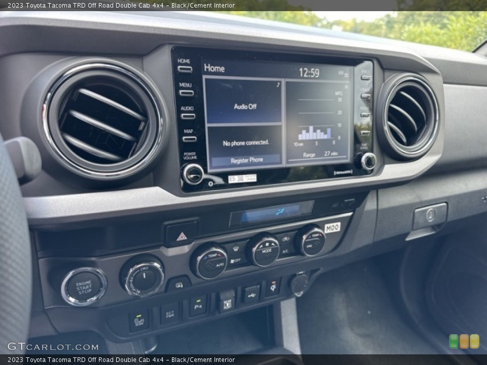 Black/Cement Interior Controls for the 2023 Toyota Tacoma TRD Off Road Double Cab 4x4 #146579652