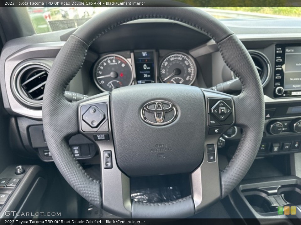 Black/Cement Interior Steering Wheel for the 2023 Toyota Tacoma TRD Off Road Double Cab 4x4 #146579682