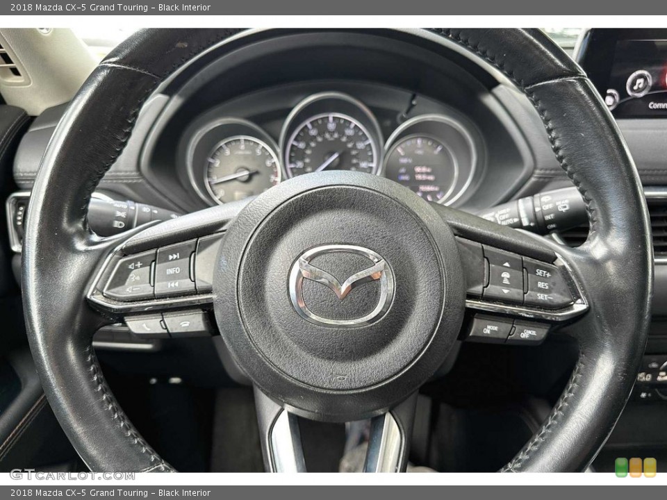 Black Interior Steering Wheel for the 2018 Mazda CX-5 Grand Touring #146585862