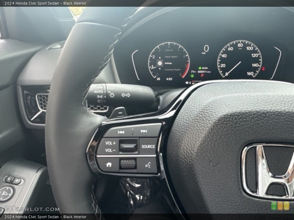 Black Interior Steering Wheel for the 2024 Honda Civic Sport Sedan #146596838