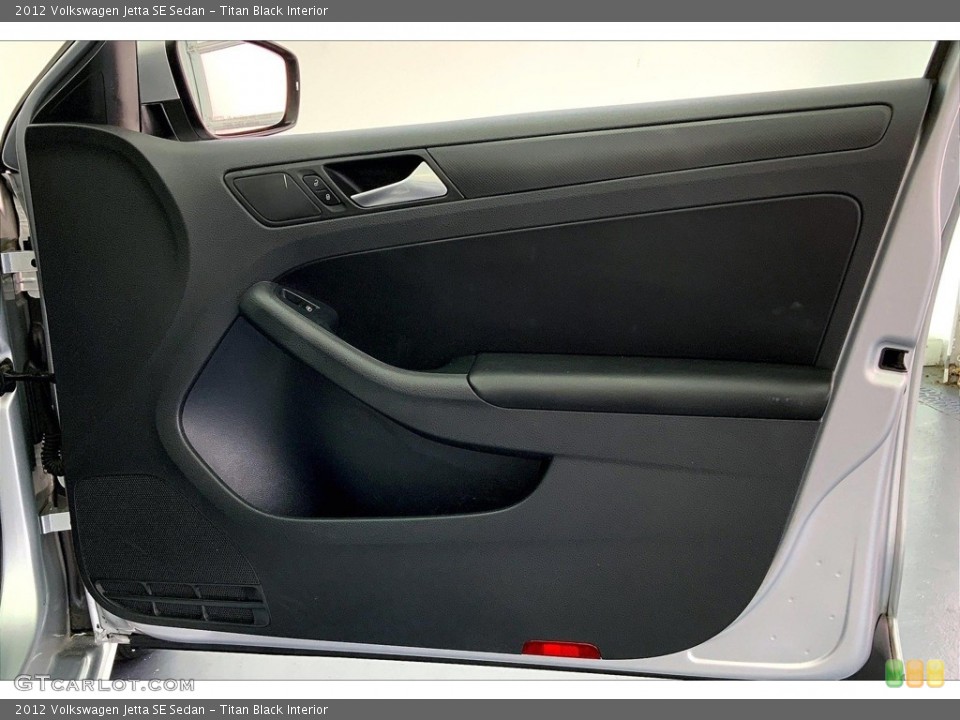 Titan Black Interior Door Panel for the 2012 Volkswagen Jetta SE Sedan #146600023