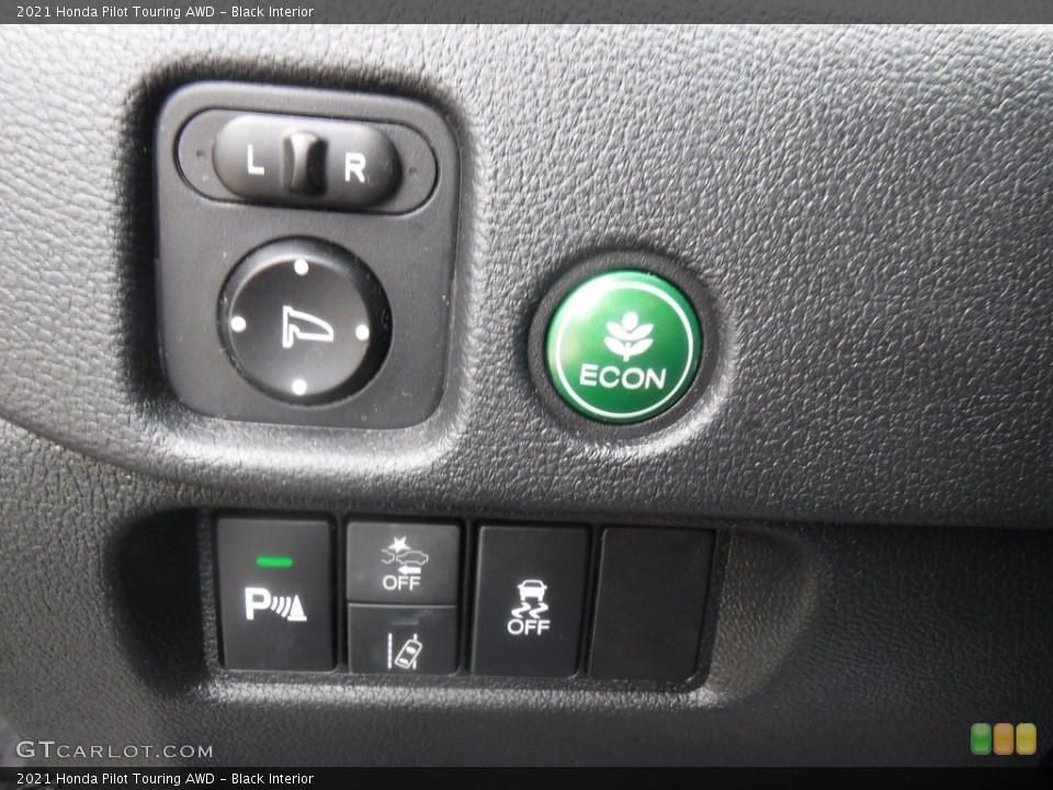 Black Interior Controls for the 2021 Honda Pilot Touring AWD #146602041
