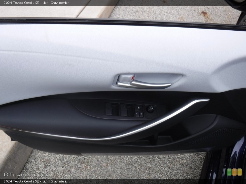 Light Gray Interior Door Panel for the 2024 Toyota Corolla SE #146604013