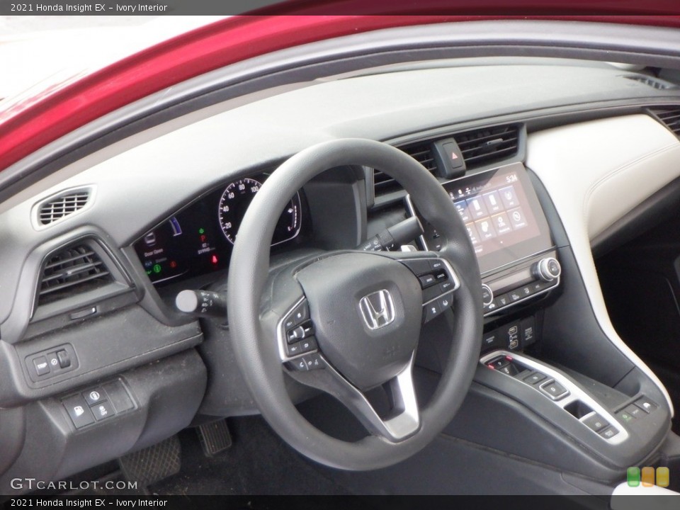 Ivory Interior Dashboard for the 2021 Honda Insight EX #146621980