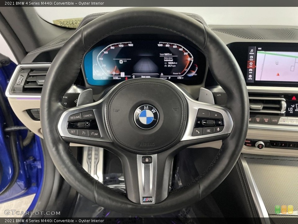 Oyster Interior Steering Wheel for the 2021 BMW 4 Series M440i Convertible #146623379