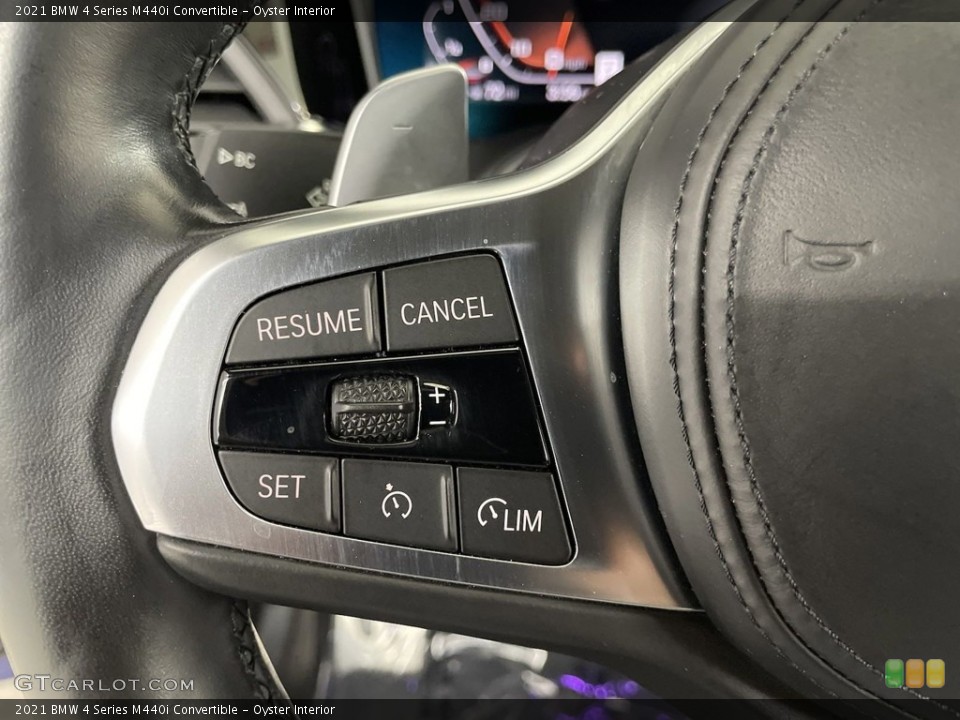 Oyster Interior Steering Wheel for the 2021 BMW 4 Series M440i Convertible #146623401