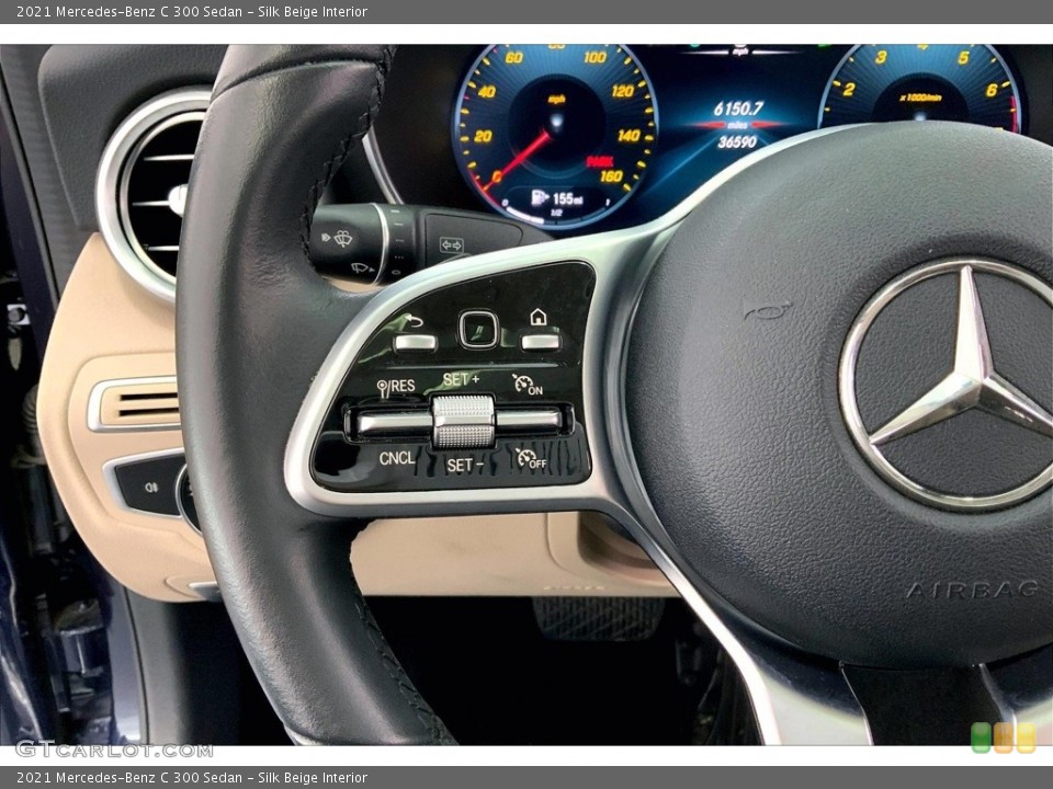 Silk Beige Interior Steering Wheel for the 2021 Mercedes-Benz C 300 Sedan #146623485