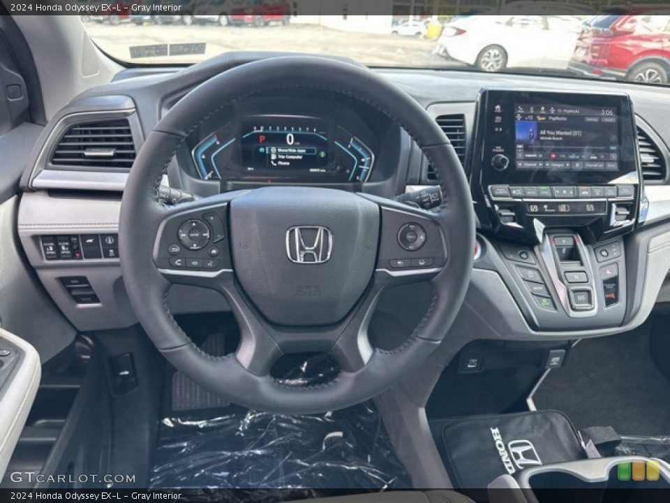 Gray Interior Dashboard for the 2024 Honda Odyssey EX-L #146627135