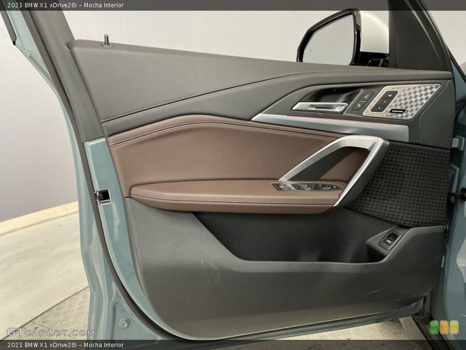 Mocha Interior Door Panel for the 2023 BMW X1 xDrive28i #146632255