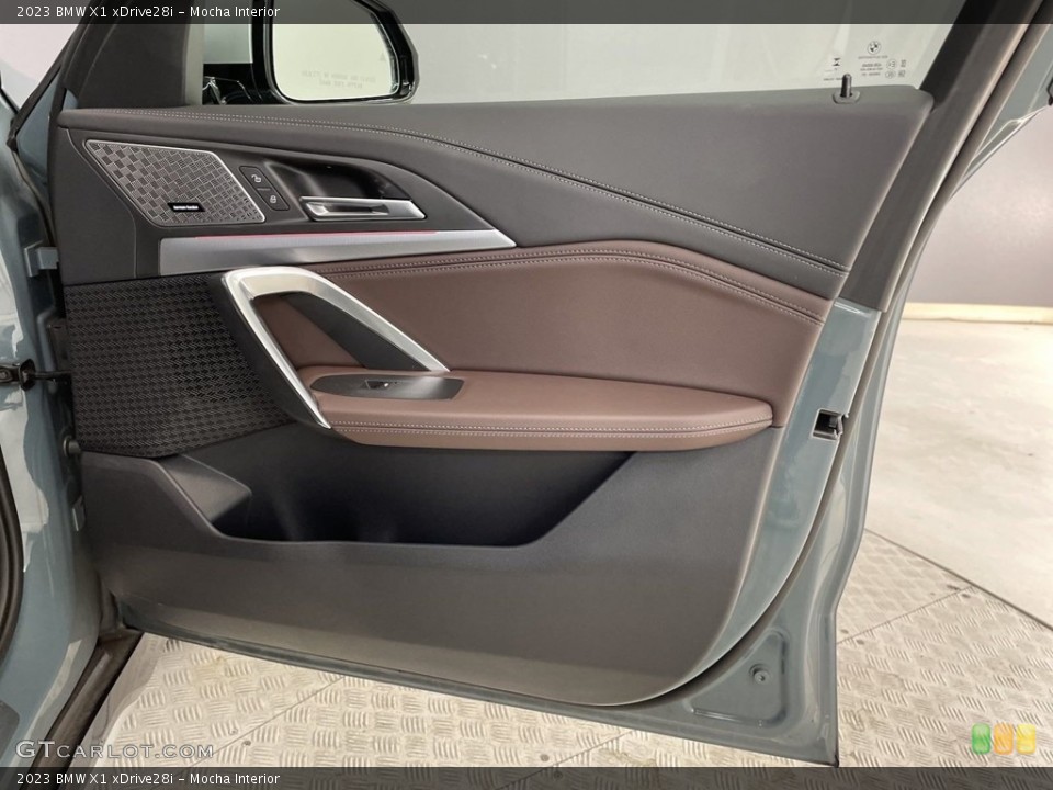 Mocha Interior Door Panel for the 2023 BMW X1 xDrive28i #146632825