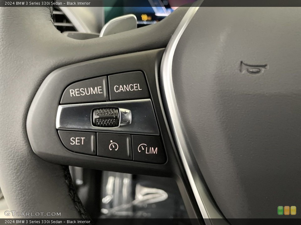Black Interior Steering Wheel for the 2024 BMW 3 Series 330i Sedan #146639038