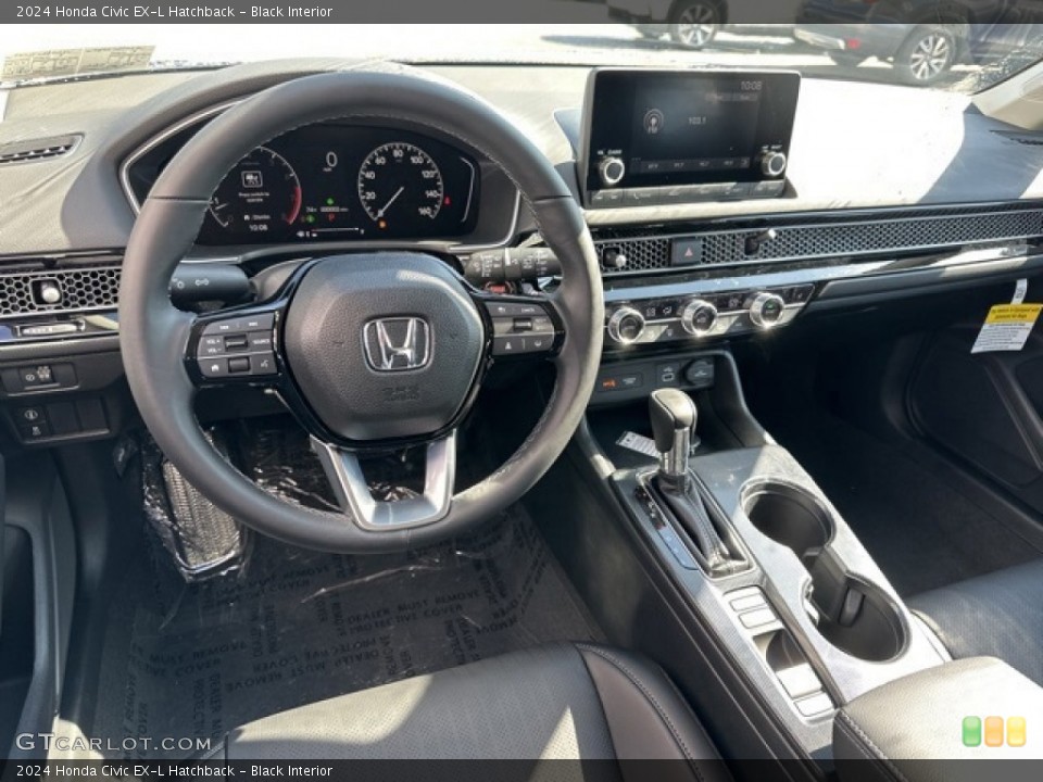 Black Interior Dashboard for the 2024 Honda Civic EX-L Hatchback #146642917