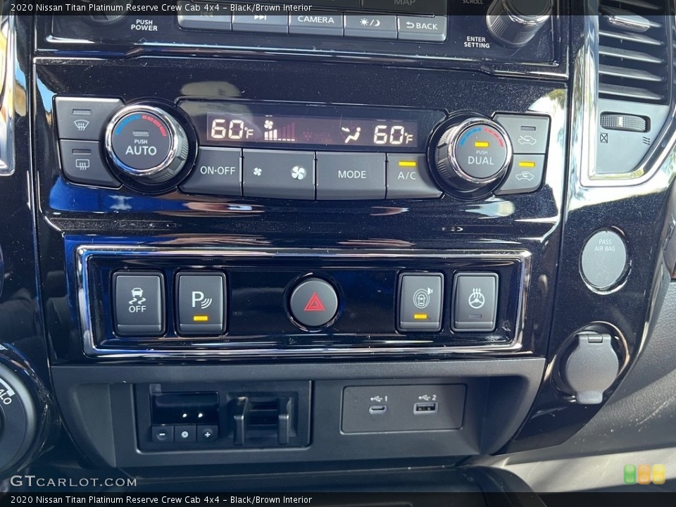 Black/Brown Interior Controls for the 2020 Nissan Titan Platinum Reserve Crew Cab 4x4 #146646077