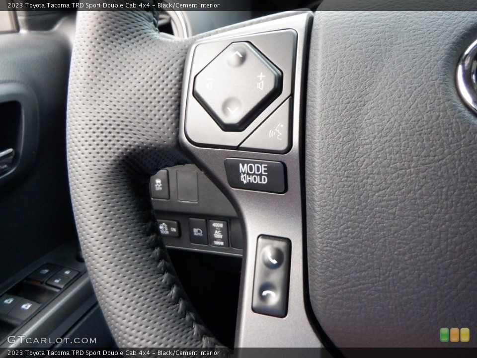 Black/Cement Interior Steering Wheel for the 2023 Toyota Tacoma TRD Sport Double Cab 4x4 #146653274