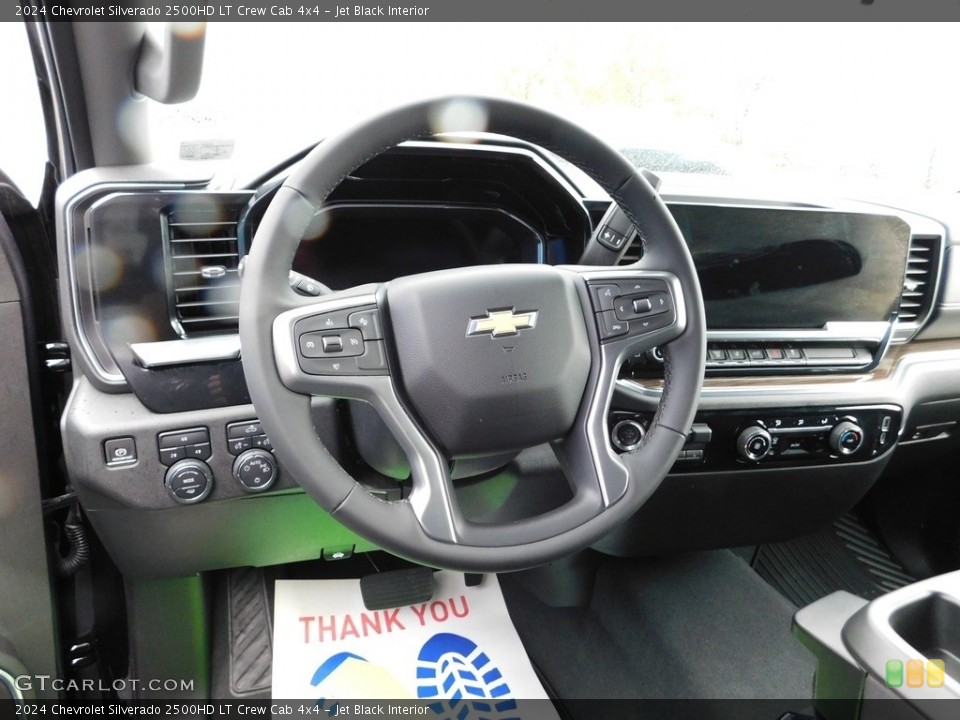 Jet Black Interior Steering Wheel for the 2024 Chevrolet Silverado 2500HD LT Crew Cab 4x4 #146682662