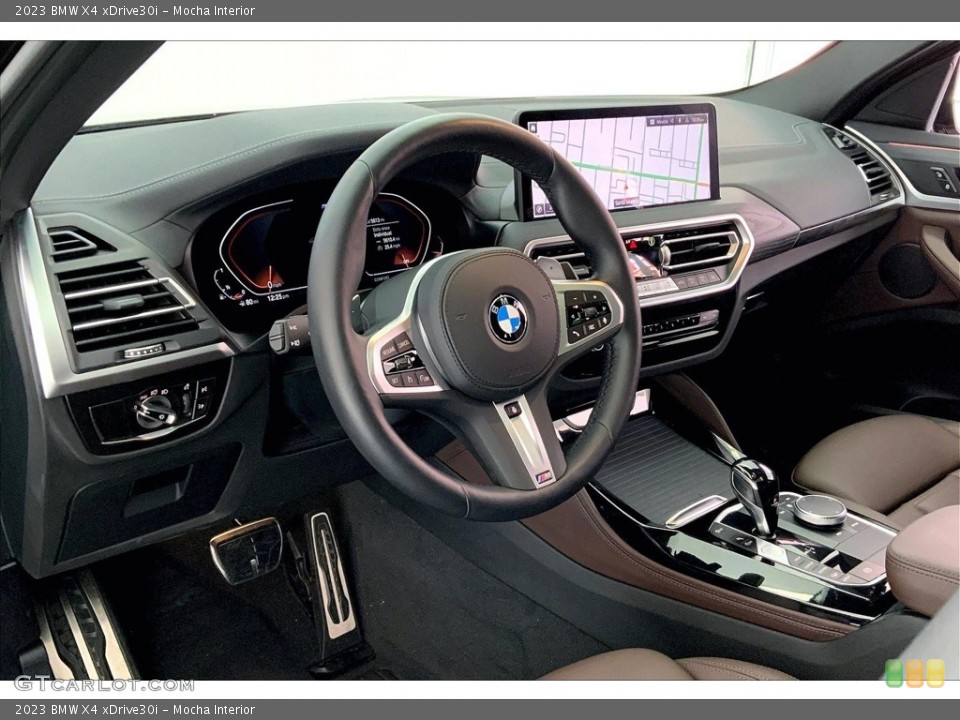 Mocha Interior Dashboard for the 2023 BMW X4 xDrive30i #146687682