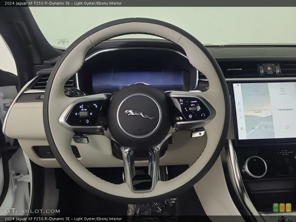 Light Oyster/Ebony Interior Steering Wheel for the 2024 Jaguar XF P250 R-Dynamic SE #146729804