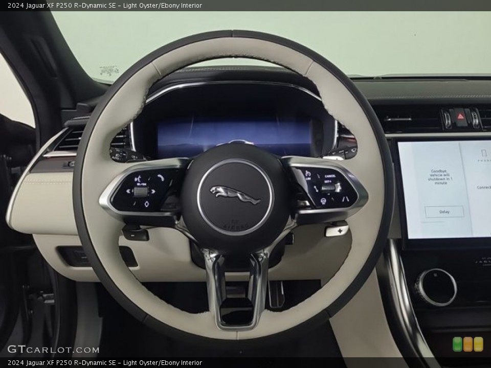 Light Oyster/Ebony Interior Steering Wheel for the 2024 Jaguar XF P250 R-Dynamic SE #146730639