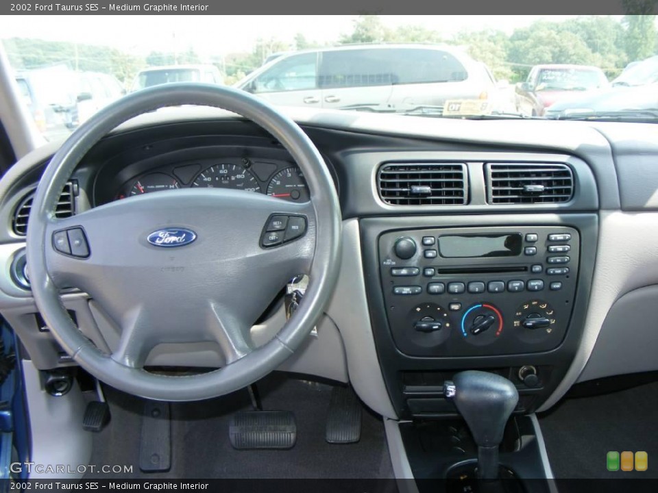 Medium Graphite Interior Dashboard for the 2002 Ford Taurus SES #15885076