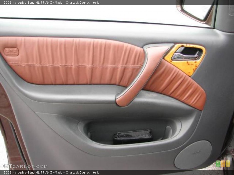Charcoal/Cognac Interior Door Panel for the 2002 Mercedes-Benz ML 55 AMG 4Matic #18134159