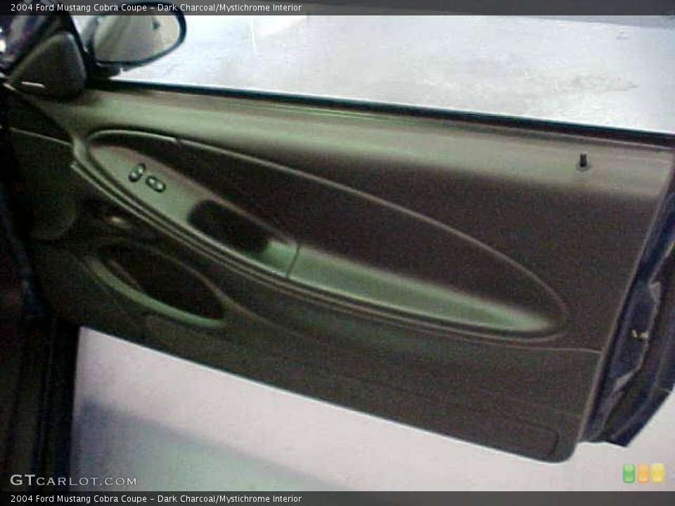 Dark Charcoal/Mystichrome Interior Door Panel for the 2004 Ford Mustang Cobra Coupe #20330275
