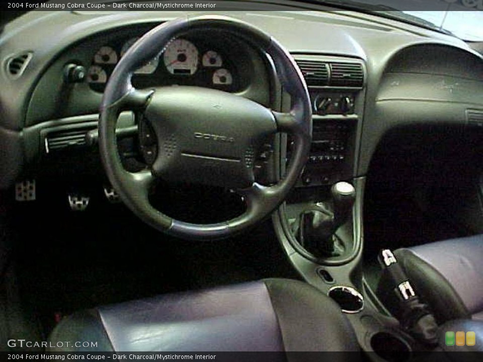 Dark Charcoal/Mystichrome Interior Dashboard for the 2004 Ford Mustang Cobra Coupe #20330319