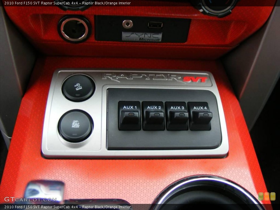 Raptor Black/Orange Interior Controls for the 2010 Ford F150 SVT Raptor SuperCab 4x4 #23096491