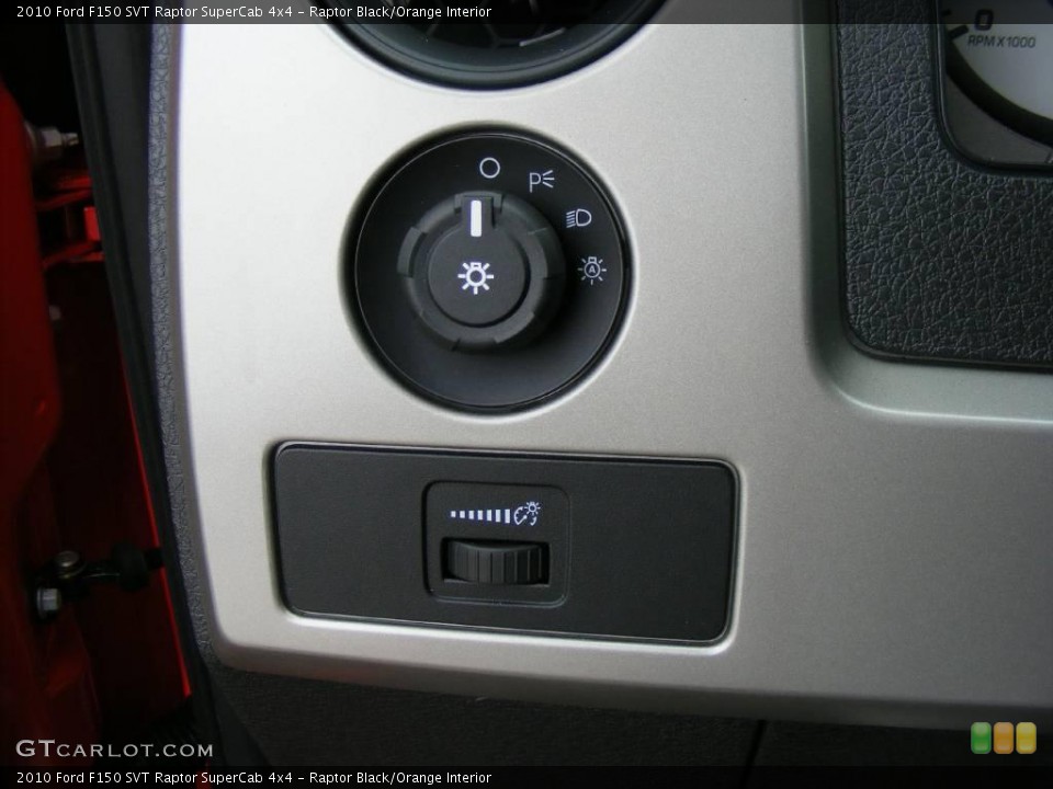 Raptor Black/Orange Interior Controls for the 2010 Ford F150 SVT Raptor SuperCab 4x4 #23096579